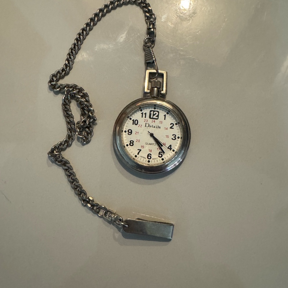 Vintage Silver Pocket Watch with Classic Chain